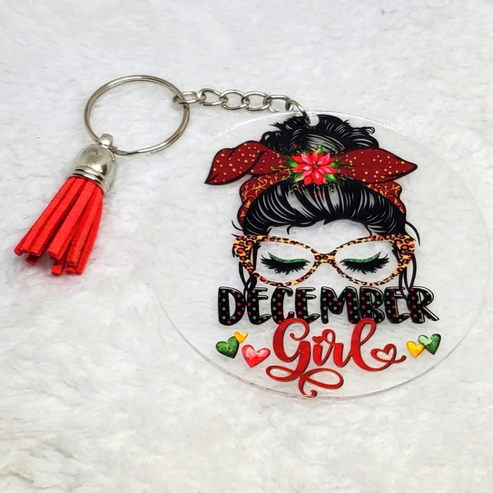 7/$10 December Girl Keychain with Tassel, New